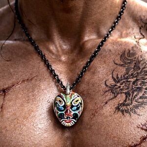 Vintage clay Chinese theatrical masks handpainted mounted resin brass pendant